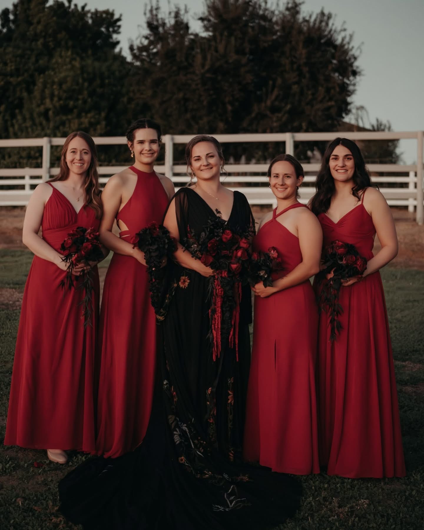 Wedding party in red and black attire